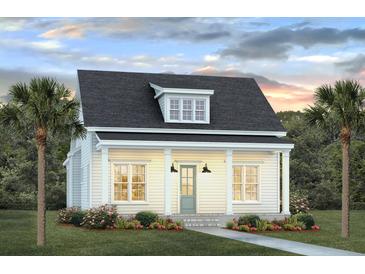 Charming one-story home featuring a welcoming front porch and neatly landscaped yard at 822 Gentle Breeze Dr, Summerville, SC 29486