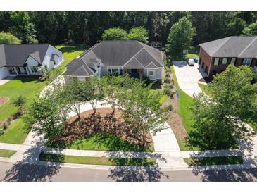 Stunning aerial view of home featuring a landscaped front yard and circular driveway at 3751 St Ellens Dr, Mount Pleasant, SC 29466