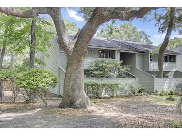 Charming condo with mature landscaping and large shade trees in a peaceful setting at 1208 Village Creek Ln Ln # 1, Mount Pleasant, SC 29464