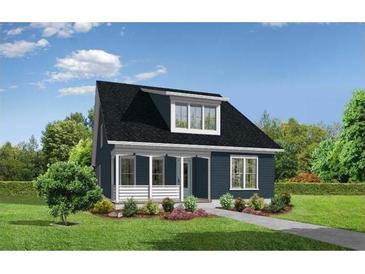 Charming two-story home with dark siding, black roof, a covered porch and well-maintained landscaping at 2048 Ten Point Dr, Charleston, SC 29492