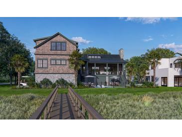 Beautiful backyard with a pool, seating areas, lush greenery, and charming home exterior at 27 Rebellion Rd, Charleston, SC 29407