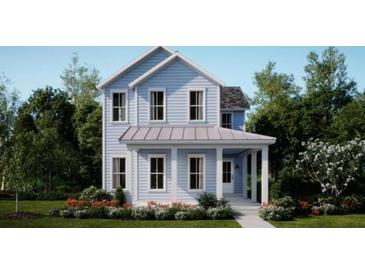 Charming two-story home with light-blue siding, white trim, and a welcoming front porch at 109 Battle Boat Blvd, Summerville, SC 29485