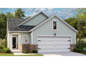 Charming single-Gathering home featuring a two-car garage and stone accents on the lower exterior at 1019 Sagegrass St, Summerville, SC 29485
