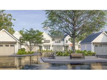 Charming exteriors showcasing craftsman-style architecture with lush landscaping and inviting curb appeal at 409 Oak Hammock Ct # 50, Johns Island, SC 29455