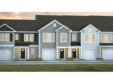 Charming townhome featuring craftsman-style architecture, attached garages, and manicured landscaping at 133 Haventree Ct, Summerville, SC 29486