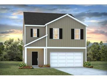 New two-story home with black shutters, a gray exterior, a two-car garage, and manicured landscaping at 415 Mistflower Ln, Moncks Corner, SC 29461