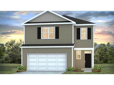 Charming two-story home with black shutters, a two-car garage, and manicured front lawn at 421 Mistflower Ln, Moncks Corner, SC 29461