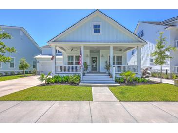 Charming single-Gathering home with a welcoming front porch, manicured lawn, and inviting curb appeal at 1787 Timmons St, Mount Pleasant, SC 29466