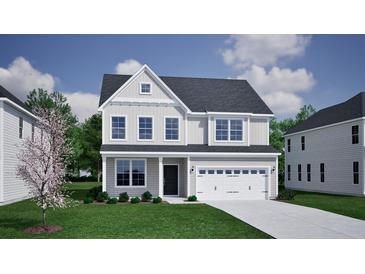 Charming two-story home with gray siding, a two-car garage, and a well-manicured lawn at 111 Crosscut Ln, Summerville, SC 29486