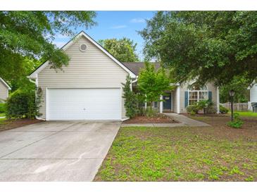 Charming single-Gathering home featuring a two-car garage and mature landscaping at 2845 August Rd, Johns Island, SC 29455
