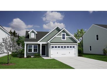Charming single-Gathering home showcasing a two-car garage and manicured lawn, enhancing curb appeal at 539 O'Leary Cir, Summerville, SC 29483