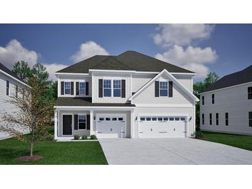 Charming two-story home with a three-car garage, black shutters, and manicured front lawn at 166 Grange Cir, Summerville, SC 29486