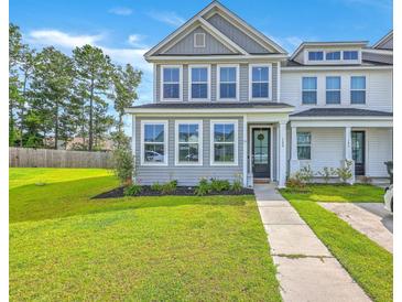 Charming two-story home with manicured lawn and inviting entryway, great curb appeal at 184 Kirkland St, Goose Creek, SC 29445