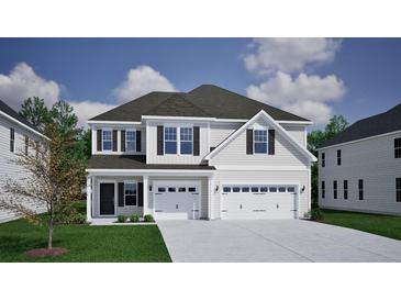 Charming two-story home with attached two-car garage and covered front porch at 3429 Seaton Street, Summerville, SC 29486