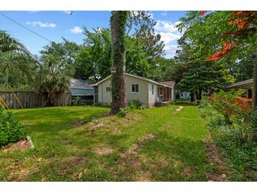 Charming single-story home with a tree-lined front yard and inviting curb appeal at 638 Cashew St, Charleston, SC 29407