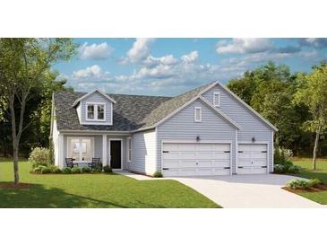 Charming single-story home featuring a two-car garage, well-manicured lawn, and inviting curb appeal at 1130 Darling St, Summerville, SC 29485
