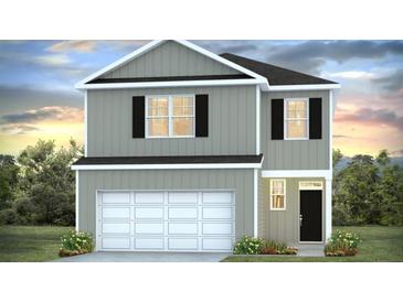Charming two-story home with gray siding, black shutters and a two car garage in a landscaped setting at 6039 Savy Ct, Ravenel, SC 29470