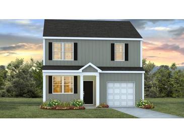 Charming two-story home with gray siding, black shutters, and a well-manicured lawn at 8014 Rackham Rd, Hollywood, SC 29470