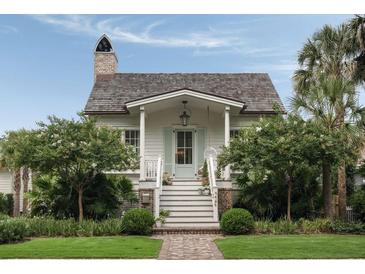 Charming front entrance featuring a brick walkway and stairs leading to a quaint porch at 926 Pitt St, Mount Pleasant, SC 29464