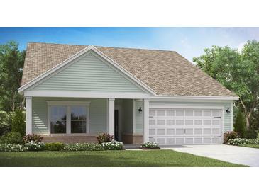 Charming one story home featuring light green siding and a two car garage at 544 Verdi Drive Dr, Summerville, SC 29486