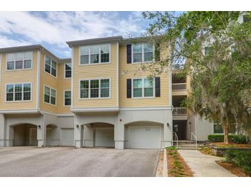 Charming multi-level home with attached garages, neutral paint, and an inviting walkway to the entrance at 60 Fenwick Hall Allee # 738, Johns Island, SC 29455