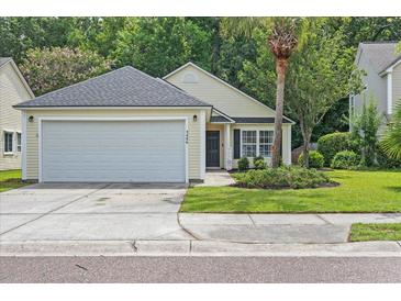 Charming single-Gathering home with a well-maintained front yard and two-car garage at 3486 Ashwycke St, Mount Pleasant, SC 29466
