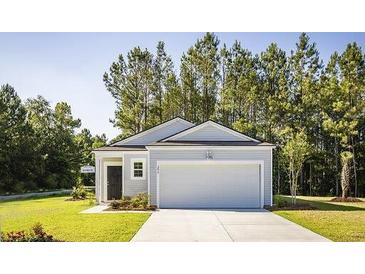 Charming one-story home with a lawn, a garage and a classic craftsman exterior at 326 Tiliwa St, Summerville, SC 29486