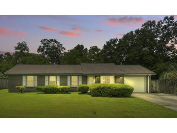 Charming single-story brick home with well-maintained landscaping and a cozy, inviting curb appeal at 102 Berkshire Ct, Goose Creek, SC 29445