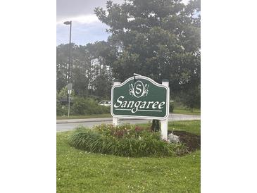 Sangaree community sign with landscaped flower bed at the entrance at 160 Lancashire Rd, Summerville, SC 29486