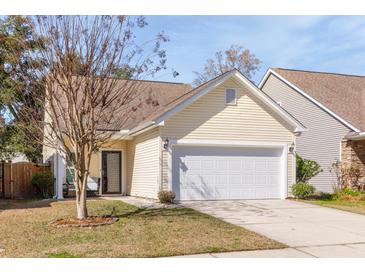 Charming single Gathering home with a two car garage and cozy front porch at 1516 Oldenburg Dr, Mount Pleasant, SC 29466