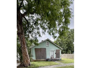 Charming one-story home with front yard and mature trees at 1912 English St, North Charleston, SC 29405