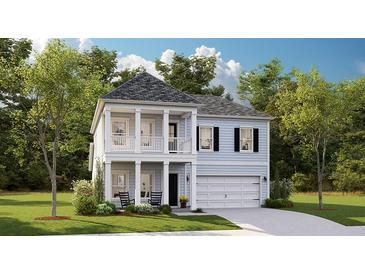 Two-story home featuring light blue siding, white columns, a gray roof, and an attached two-car garage at 171 Threaded Fern Lndg, Summerville, SC 29485