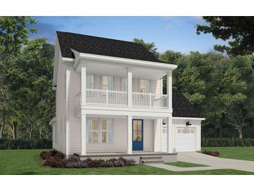 Charming two-story home featuring a covered front porch, upper level balcony, and attached garage at 1657 Clearpath Dr, Summerville, SC 29486