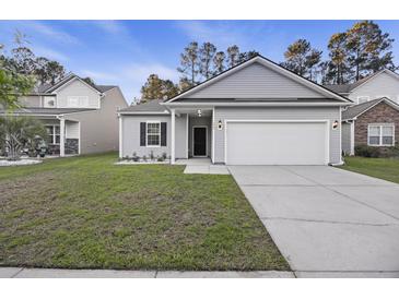 Charming single-Gathering home with a two-car garage and a well-manicured lawn in a suburban neighborhood at 278 Decatur Dr, Summerville, SC 29483