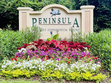 Beautifully landscaped entrance sign for the Peninsula luxury condominium resort at 700 Daniel Ellis Dr # 5103, James Island, SC 29412