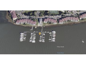 An aerial view of the community marina, with boat slips available for residents and easy access to Folly River and Folly Island at 2 Mcdonough Rd # C-20, Folly Beach, SC 29439