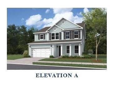 Charming two-story home with a manicured lawn, attached garage, and classic curb appeal at 353 Wappoo Trace Ln, Summerville, SC 29486