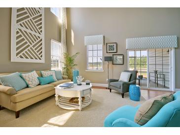 Bright and airy living room with stylish decor and comfortable seating at 507 Cropfield Dr, Summerville, SC 29485