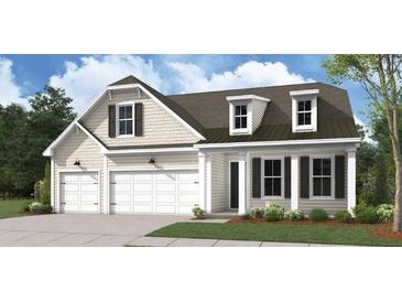 Charming two-story home with a three car garage, dormer windows, and landscaped front yard at 731 Maynard Ln, Summerville, SC 29486