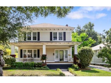 Charming two-story home with a welcoming front porch and well-maintained landscaping at 4626 O'Hear Ave, North Charleston, SC 29405