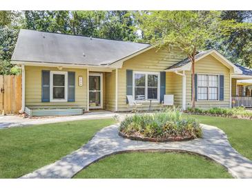 Charming single-story home with a lush front yard, walkway, and inviting facade at 703 Temple Rd # A, Ladson, SC 29456