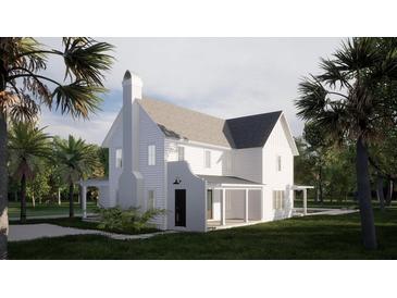 Stunning exterior elevation of a white two-story home, showcasing its inviting front porch and well-manicured landscaping at 2640 Battle Trail Dr, Johns Island, SC 29455