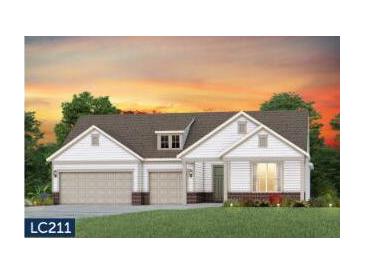 Charming single-Gathering home with a three-car garage and manicured lawn under a colorful sky at 520 Pink Lily Ln, Summerville, SC 29486
