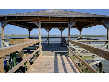 Picturesque gazebo on the water offering a serene spot to relax and enjoy waterfront views at 1551 Ben Sawyer Blvd # 4D, Mount Pleasant, SC 29464