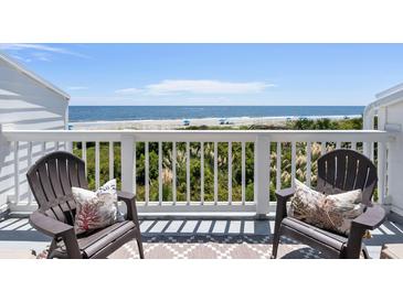 Beautiful balcony view with two chairs and a view of the beach at 7 Beach Club Villas, Isle of Palms, SC 29451