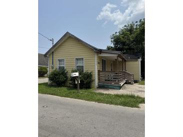 Charming bungalow-style home with a covered front porch and well-maintained yard at 1969 Comstock Ave, North Charleston, SC 29405