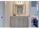 Bathroom features vanity with quartz countertop and gray cabinets at 173 Fiddleback Dr, Summerville, SC 29486