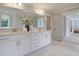 Double vanity with white cabinets, quartz countertop, and marble floor at 173 Fiddleback Dr, Summerville, SC 29486