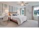 Bright bedroom featuring a wood bed frame and a chic work space at 173 Fiddleback Dr, Summerville, SC 29486