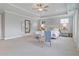 Main bedroom with high ceilings, large windows, and a sitting area at 173 Fiddleback Dr, Summerville, SC 29486